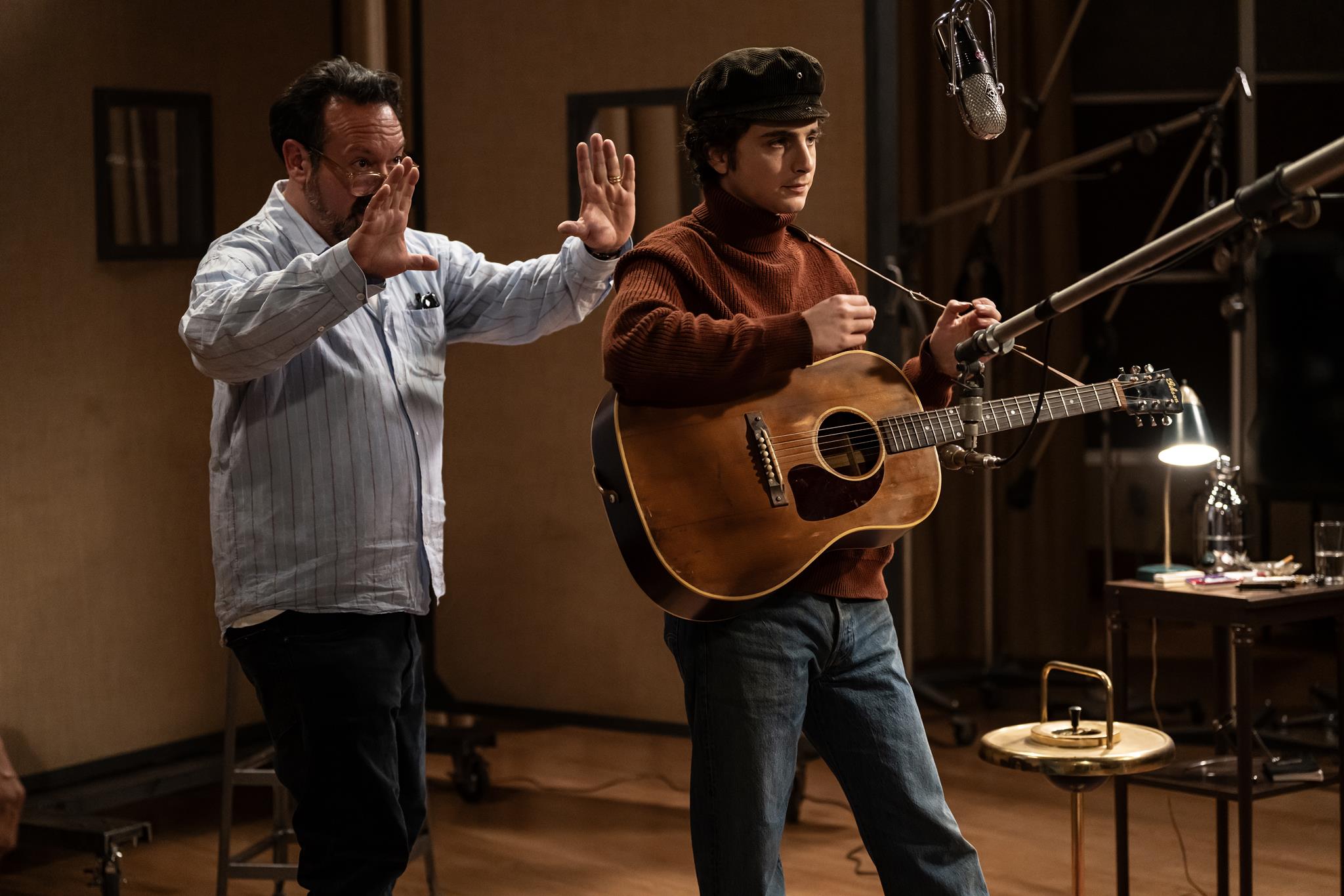 Director James Mangold and Timothée Chalamet on the set of A COMPLETE UNKNOWN. Photo by Macall Polay, Courtesy of Searchlight Pictures. © 2024 Searchlight Pictures All Rights Reserved.